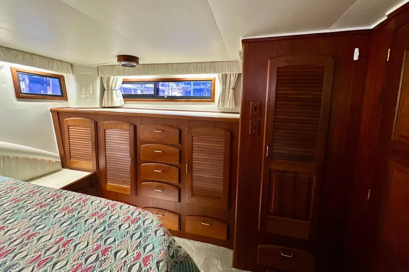 Anchored Souls Yacht Photos Pics Interior of 1988 Californian 45 Motor Yacht with wooden cabinetry and windows.
