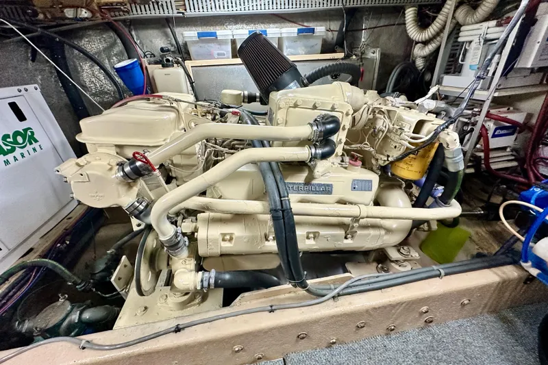 Anchored Souls Yacht Photos Pics Engine room of a 1988 Californian 45 Motor Yacht with Caterpillar engine.