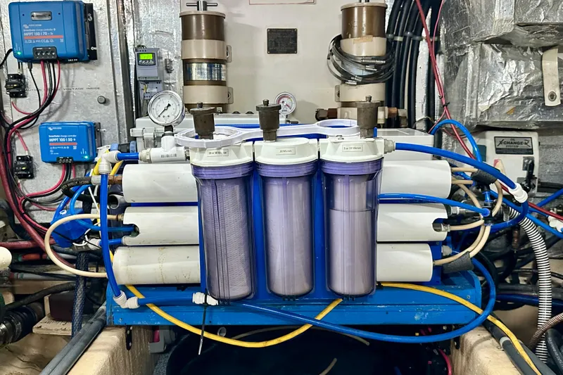 Anchored Souls Yacht Photos Pics Engine room of 1988 Californian 45 Motor Yacht with water filtration system.