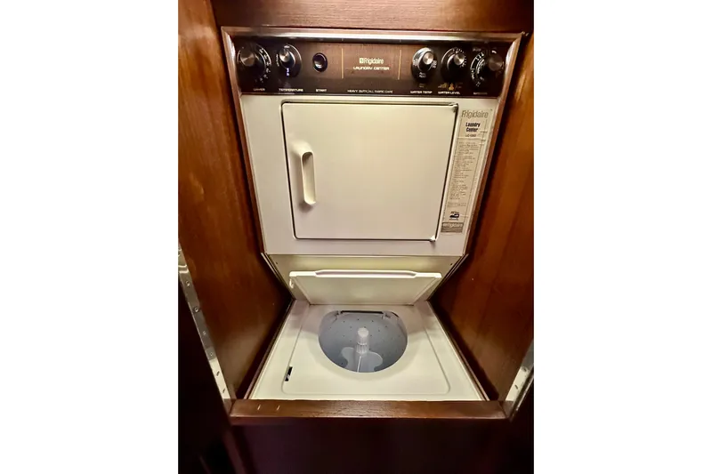 Anchored Souls Yacht Photos Pics Frigidaire laundry center in 1988 Californian 45 Motor Yacht, featuring washer and dryer.