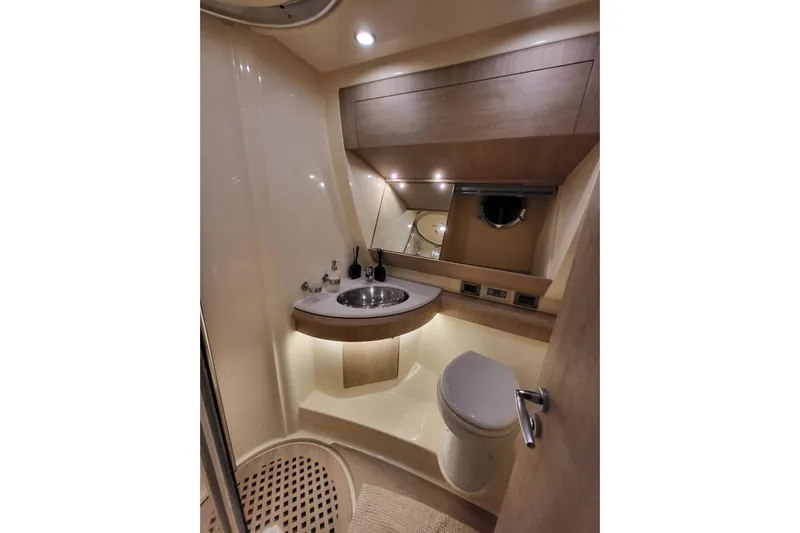 11:11 Yacht Photos Pics Luxurious bathroom interior of 2006 Azimut Fly 50 yacht with modern fixtures.