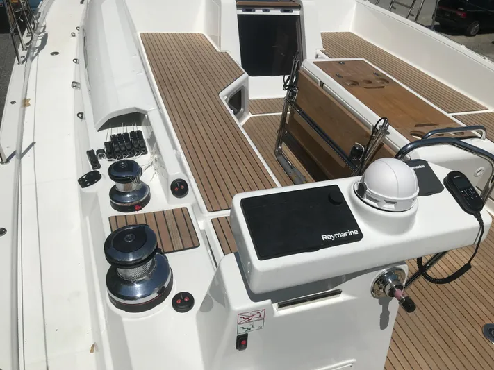  Yacht Photos Pics Deck view of 2020 Jeanneau 54 sailboat with Raymarine equipment and teak flooring.