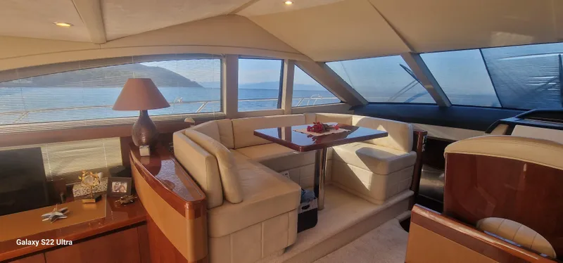  Yacht Photos Pics Luxurious interior of a 2008 Princess 50 yacht with elegant seating and ocean view.