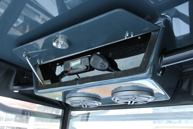  Yacht Photos Pics 2019 Conch 33 boat console with radio and speakers.