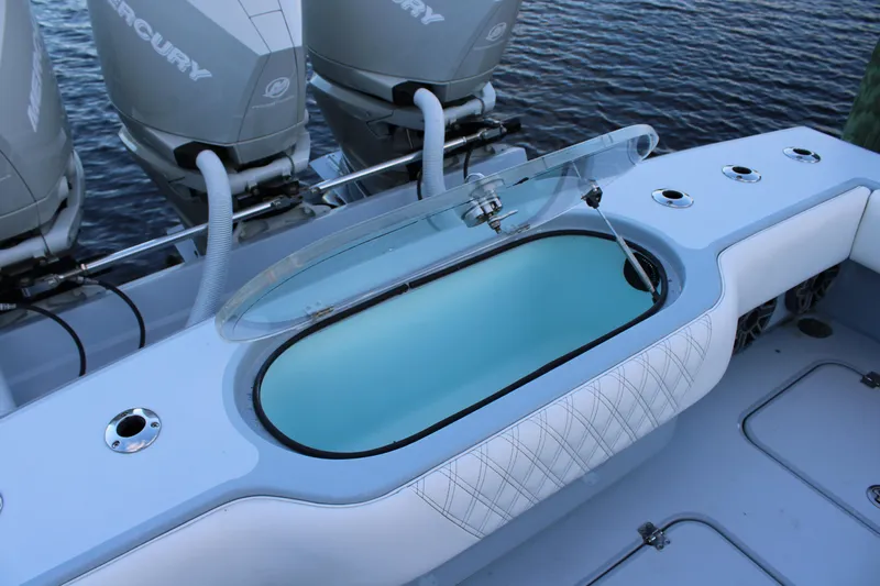  Yacht Photos Pics 2019 Conch 33 boat with open livewell and Mercury outboard engines.