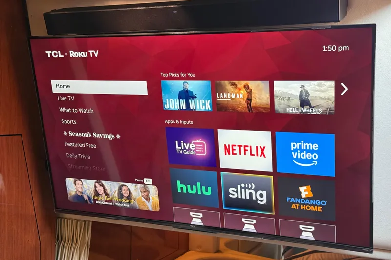  Yacht Photos Pics TCL Roku TV displaying streaming apps on a Sea Ray 340 Sundancer, 2006 model.