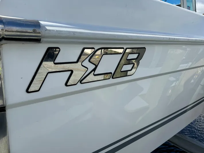  Yacht Photos Pics 2019 HCB Siesta boat logo on white hull.