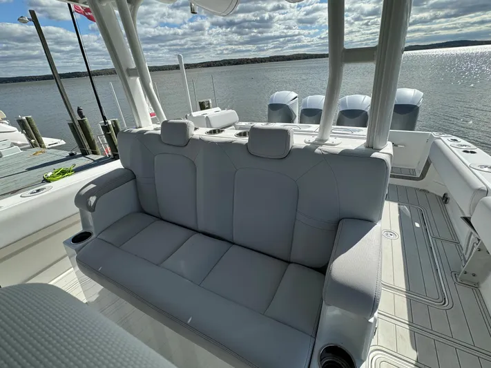  Yacht Photos Pics 2019 HCB Siesta boat with spacious seating and scenic water view.