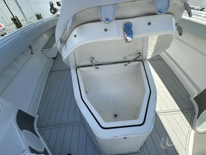  Yacht Photos Pics 2019 HCB Siesta boat with open storage compartment on deck.