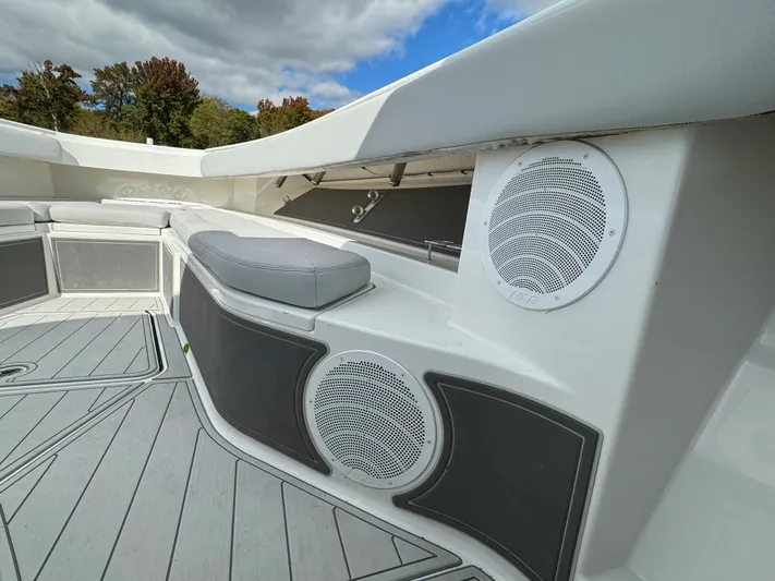 Yacht Photos Pics 2019 HCB Siesta boat interior with speakers and cushioned seating.