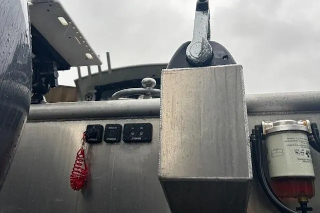 Uno Yacht Photos Pics 2012 Jaxoncraft Custom Hardtop boat controls and equipment in close-up view.