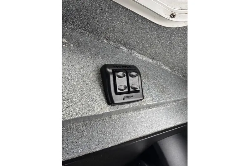 Uno Yacht Photos Pics Control panel on 2012 Jaxoncraft Custom Hardtop boat, featuring a textured surface.