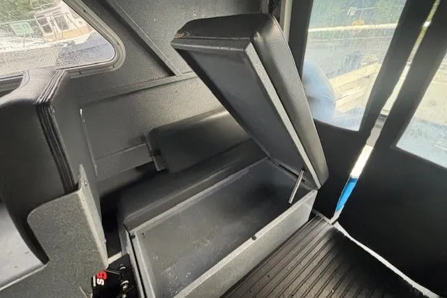 Uno Yacht Photos Pics Interior of 2012 Jaxoncraft Custom Hardtop with open storage compartment.