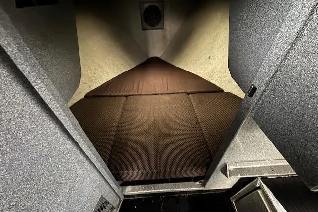 Uno Yacht Photos Pics Interior cabin of 2012 Jaxoncraft Custom Hardtop boat with brown cushioned bed.