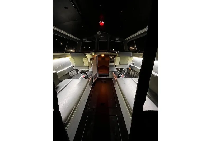 Uno Yacht Photos Pics Interior of 2012 Jaxoncraft Custom Hardtop boat with illuminated seating and modern design.