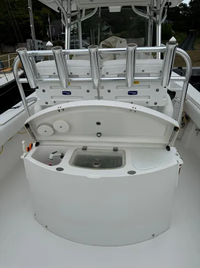  Yacht Photos Pics 2009 Regulator 34SS boat with fishing rod holders and storage compartment.