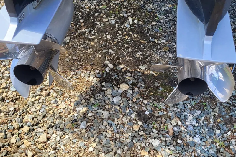  Yacht Photos Pics 2022 Fountain 34 SC boat propellers on gravel surface.