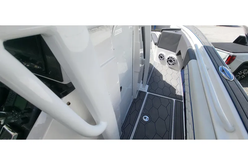  Yacht Photos Pics 2022 Fountain 34 SC boat interior with sleek flooring and modern design elements.