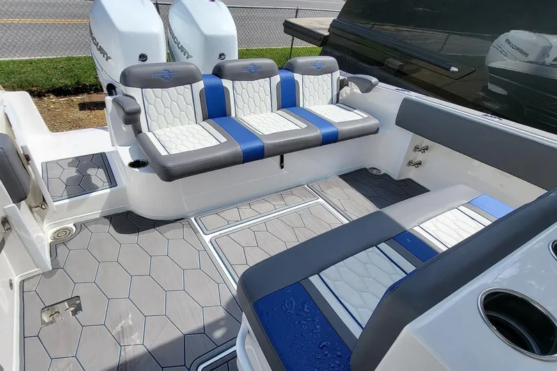  Yacht Photos Pics 2022 Fountain 34 SC boat interior with stylish seating and modern design.