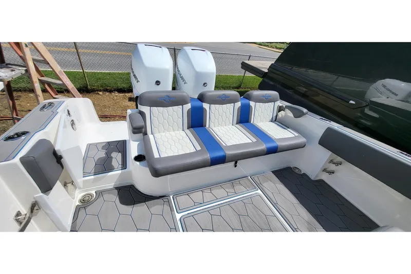  Yacht Photos Pics 2022 Fountain 34 SC boat interior with stylish seating and modern design.