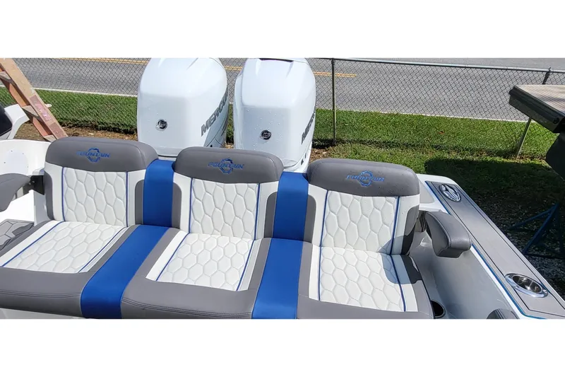  Yacht Photos Pics 2022 Fountain 34 SC boat with stylish seating and dual Mercury engines.