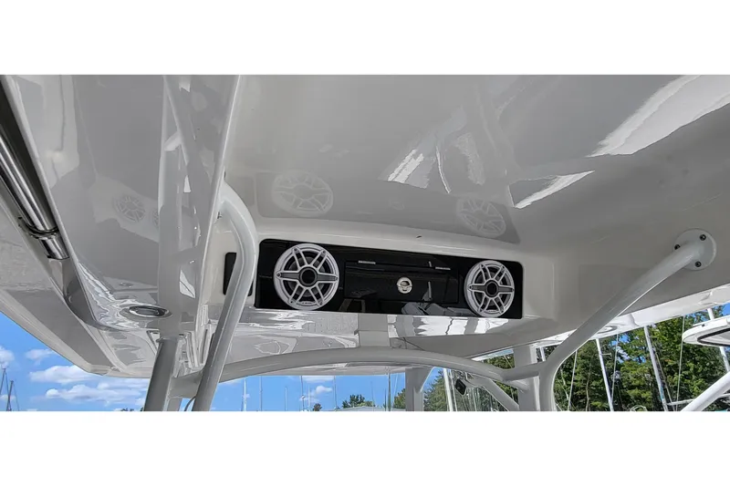  Yacht Photos Pics 2022 Fountain 34 SC boat speakers and canopy detail, showcasing sleek design and audio system.