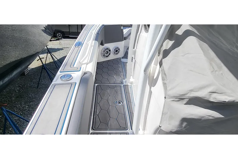  Yacht Photos Pics 2022 Fountain 34 SC boat deck with sleek design and modern features.
