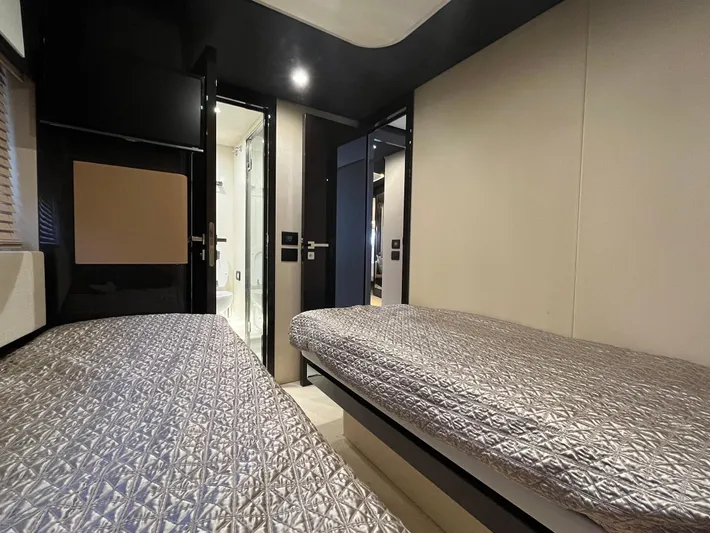  Yacht Photos Pics Interior of 2016 Azimut 77S yacht with twin beds and modern design.