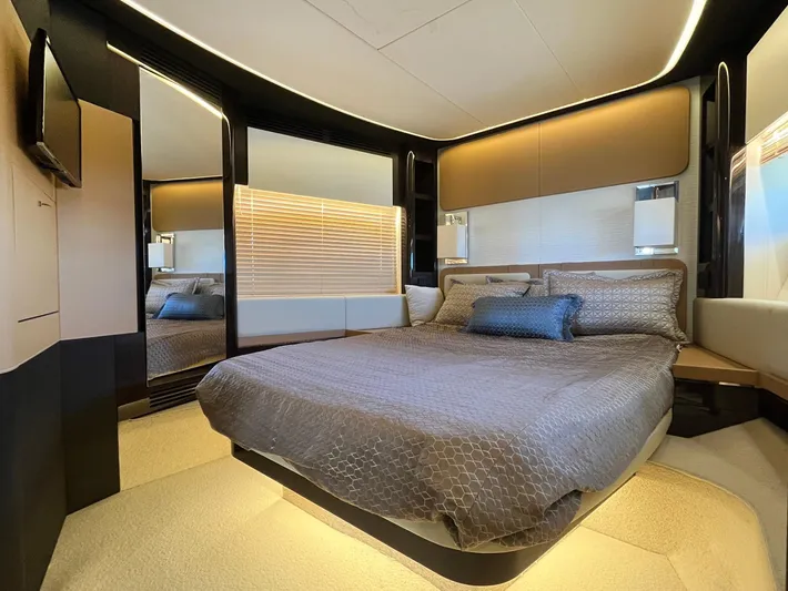  Yacht Photos Pics Luxurious bedroom interior of 2016 Azimut 77S yacht with modern design and ambient lighting.