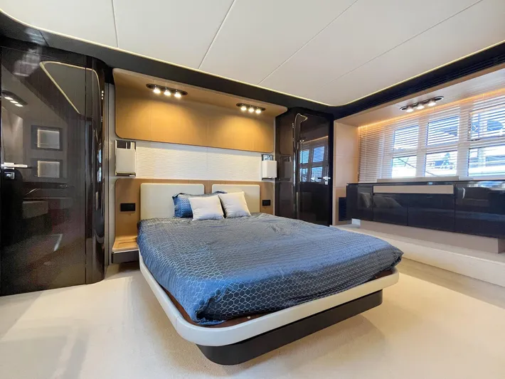  Yacht Photos Pics Luxurious bedroom interior of 2016 Azimut 77S yacht with modern design and elegant lighting.