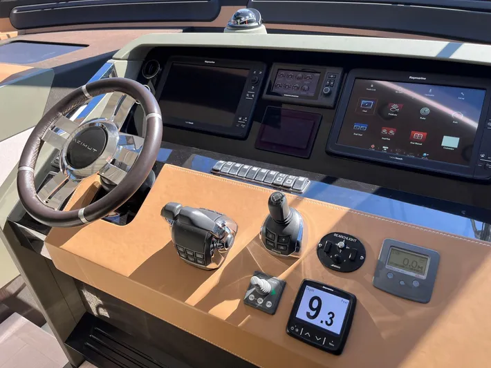  Yacht Photos Pics Control panel of a 2016 Azimut 77S yacht with advanced navigation systems.