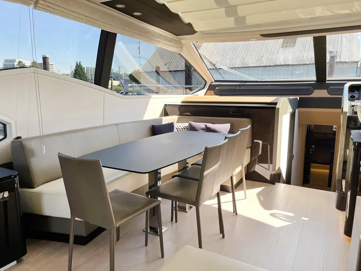  Yacht Photos Pics Luxurious interior of a 2016 Azimut 77S yacht with modern dining area.