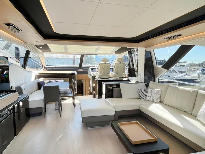  Yacht Photos Pics Luxurious interior of a 2016 Azimut 77S yacht with modern seating and panoramic windows.