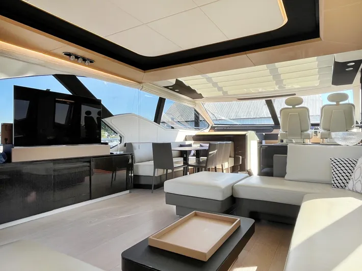 Yacht Photos Pics Luxurious interior of a 2016 Azimut 77S yacht with modern furnishings and panoramic windows.