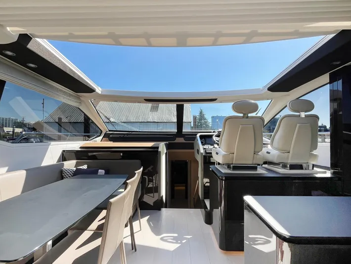  Yacht Photos Pics Interior of 2016 Azimut 77S yacht with modern seating and panoramic windows.