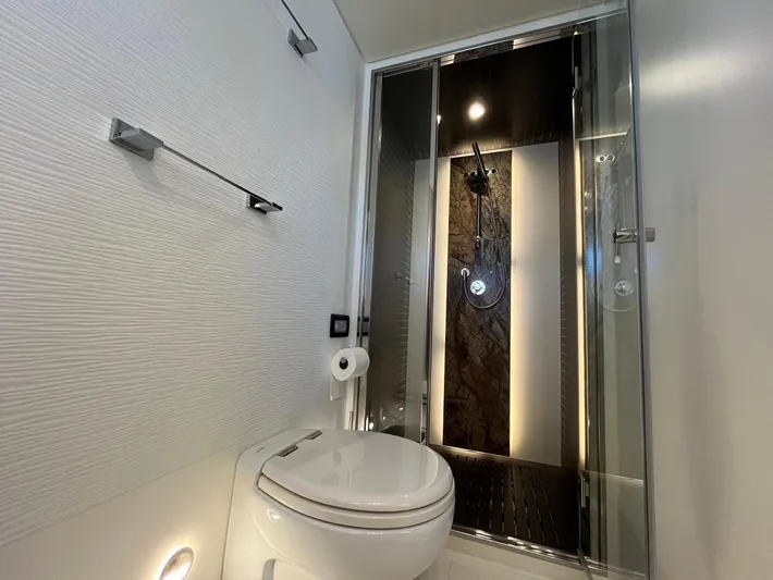  Yacht Photos Pics Luxurious bathroom in 2016 Azimut 77S yacht with modern shower and toilet.