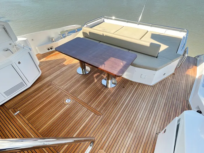  Yacht Photos Pics Luxury Azimut 77S 2016 yacht deck with wooden flooring and elegant seating area.