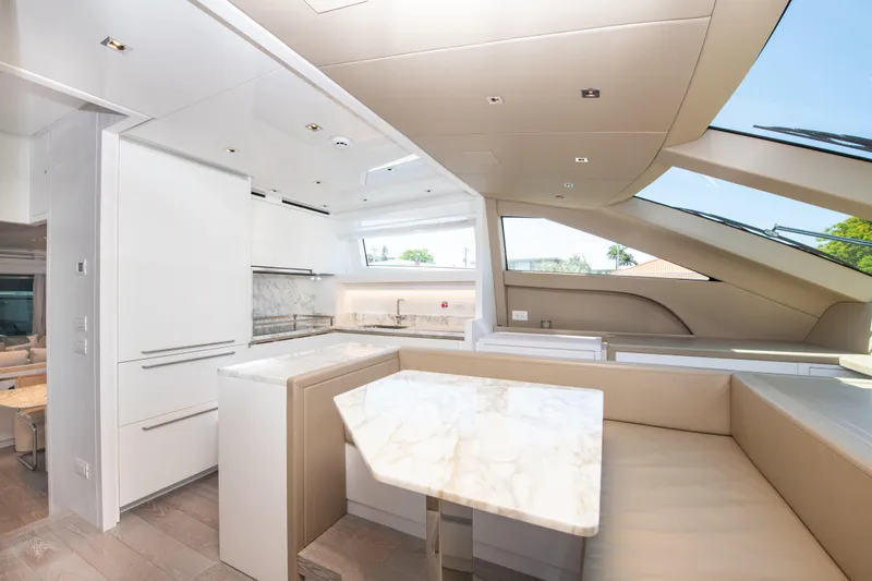 Echo Too - Sl78/753 Yacht Photos Pics Luxurious interior of 2022 Sanlorenzo SL78 yacht with modern kitchen and seating area.