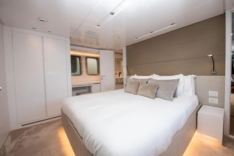 Echo Too - Sl78/753 Yacht Photos Pics Luxurious bedroom interior of 2022 Sanlorenzo SL78 yacht with modern design and ambient lighting.