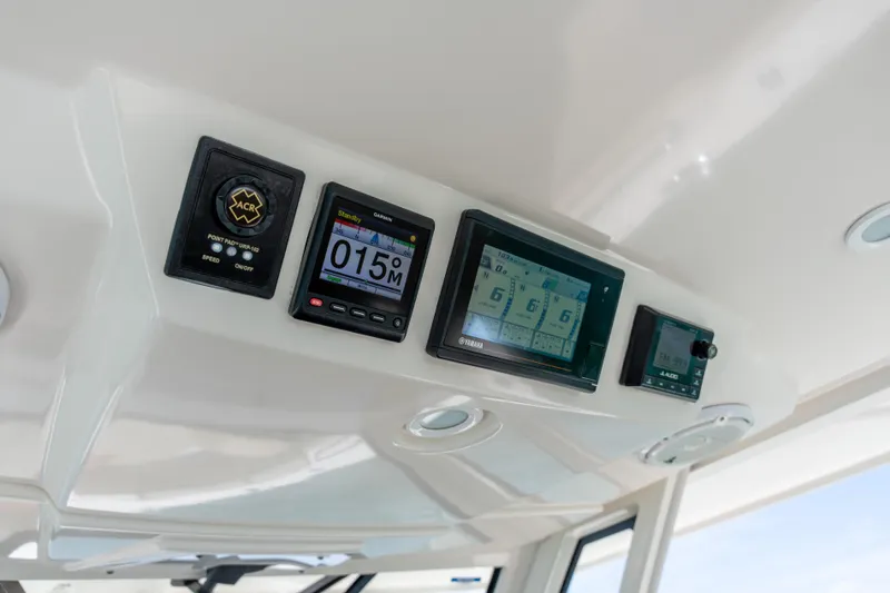 100 Percent Yacht Photos Pics 2018 Pursuit S 368 Sport dashboard with navigation and control displays.