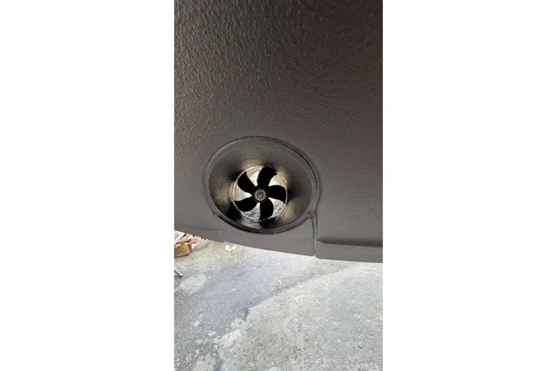 100 Percent Yacht Photos Pics 2018 Pursuit S 368 Sport boat thruster detail on textured hull.