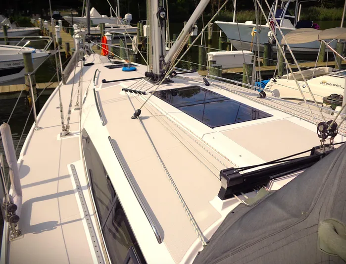 Meru Yacht Photos Pics 2019 Catalina 425 sailboat deck with rigging and hatches at marina.