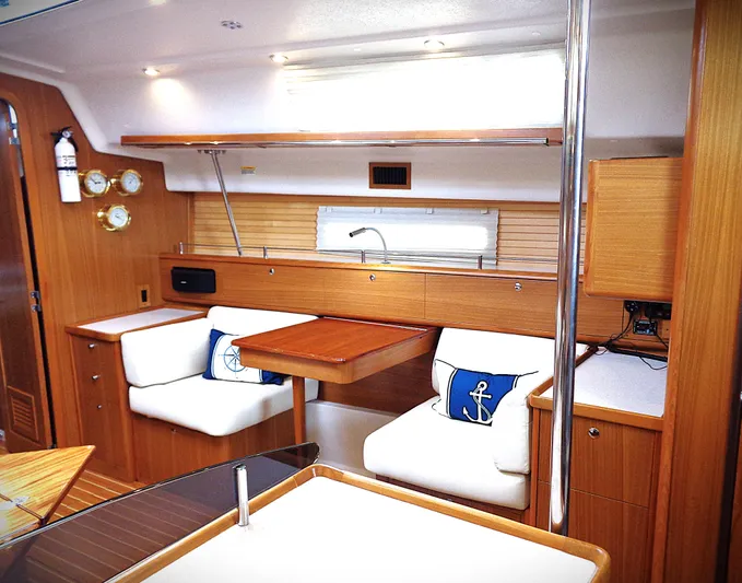 Meru Yacht Photos Pics Interior of 2019 Catalina 425 yacht with wooden furnishings and nautical-themed decor.