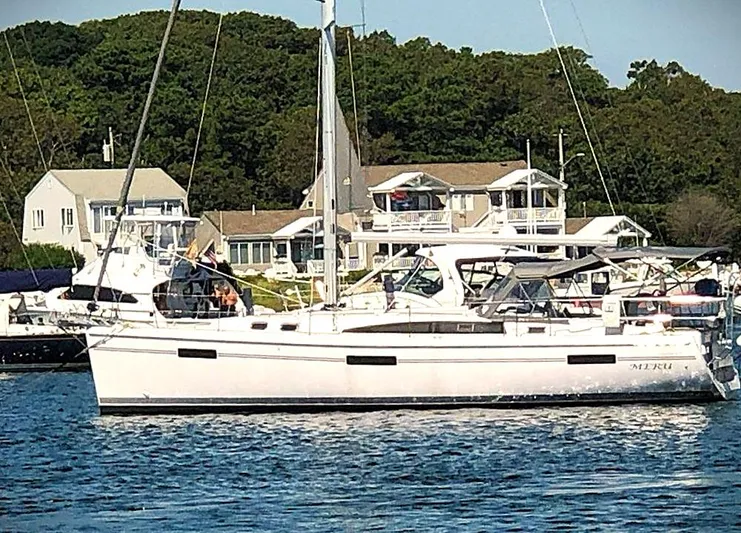 Meru Yacht Photos Pics 2019 Catalina 425 sailboat docked near waterfront homes.