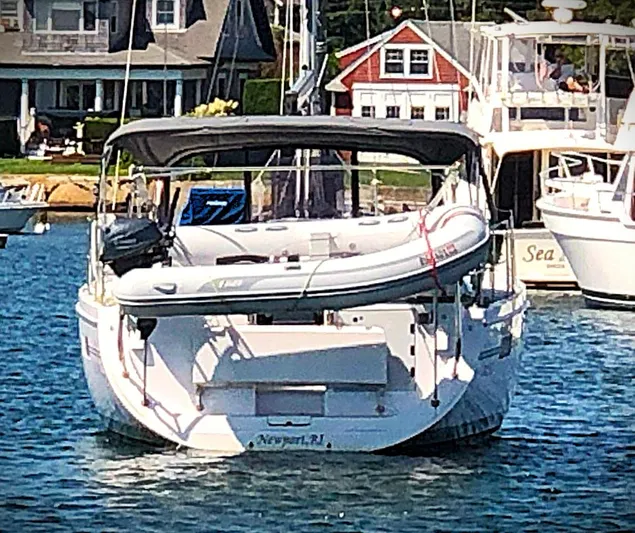 Meru Yacht Photos Pics Catalina 425 sailboat, 2019 model, docked in a marina with a dinghy on deck.