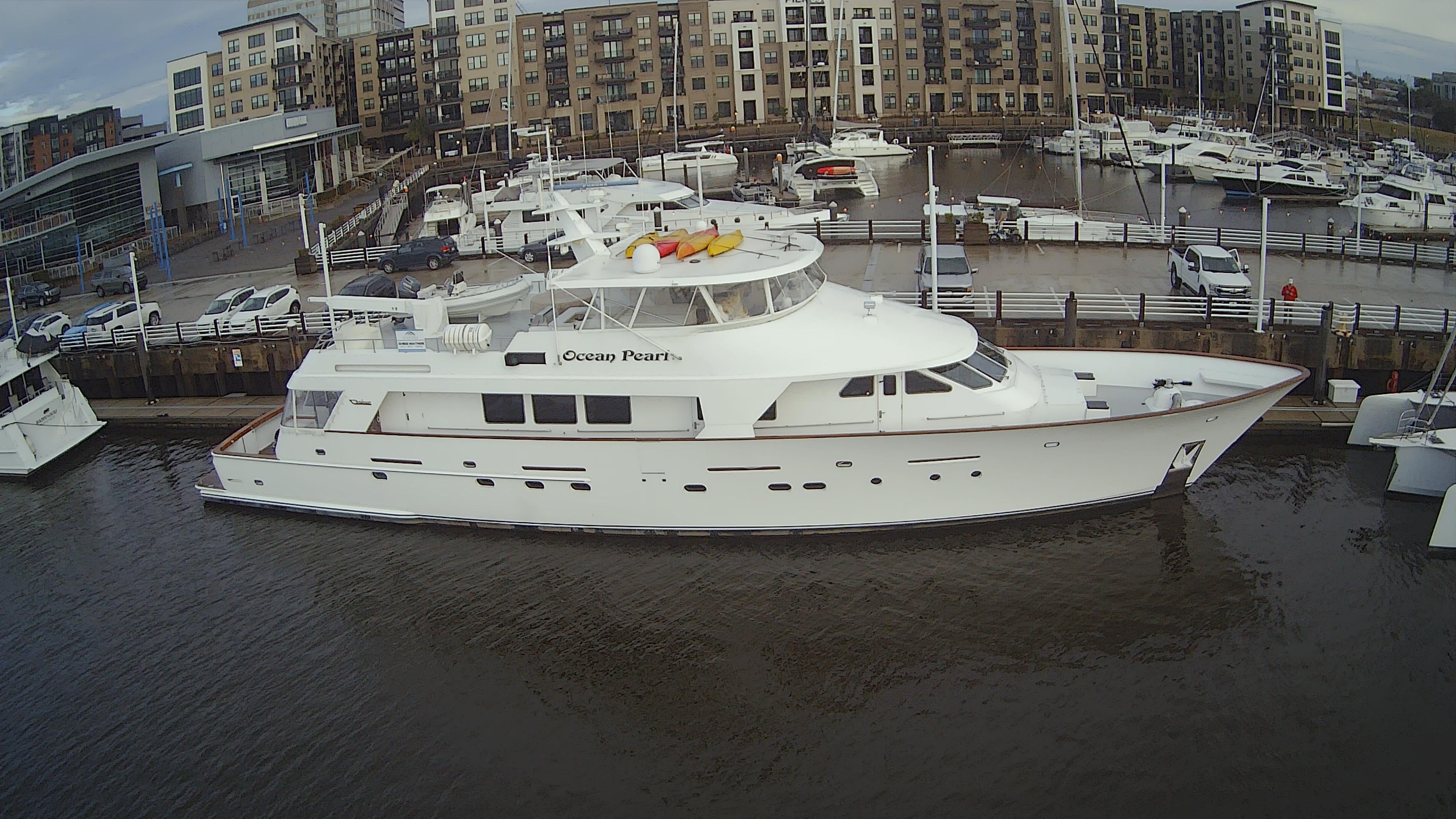 Christensen Custom 1988 luxury yacht docked in harbor.