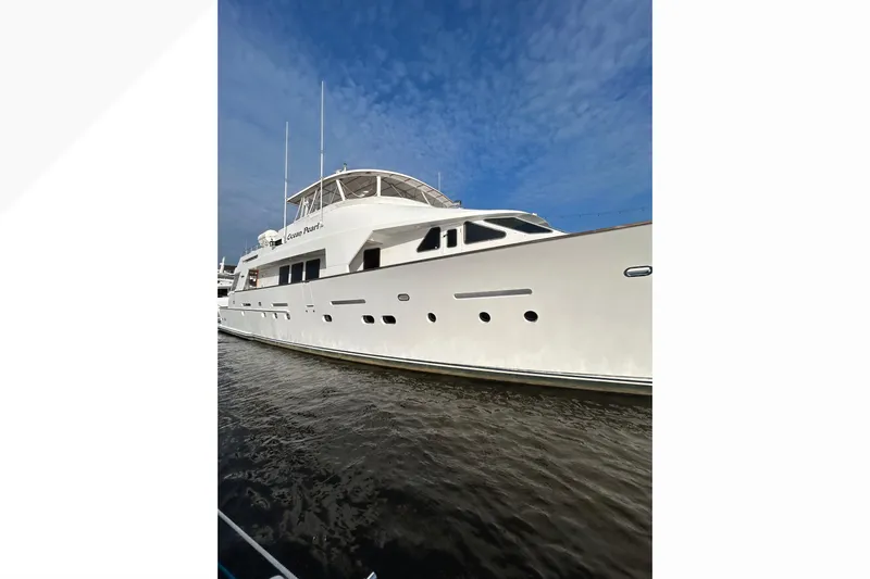 Ocean Pearl Yacht Photos Pics 1988 Christensen Custom yacht on water under blue sky.