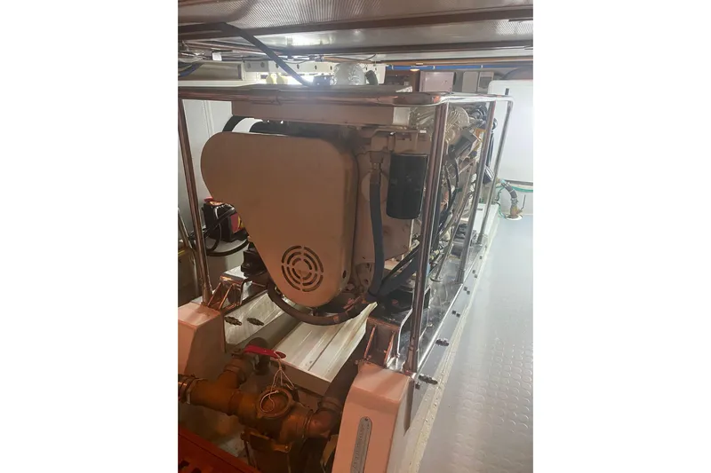  Yacht Photos Pics Engine room of 2005 Selene 47 yacht, showcasing machinery and components.