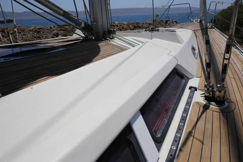  Yacht Photos Pics 2007 Hanse 430e sailboat deck with wooden finish and ocean view.