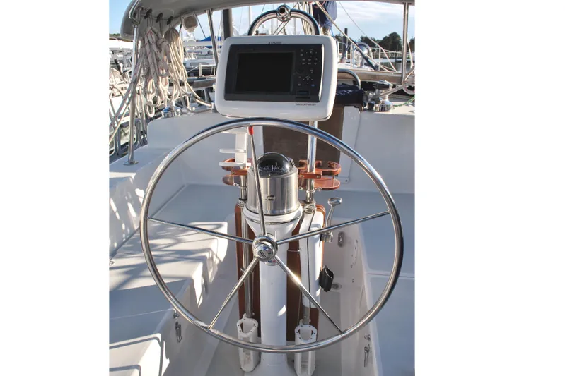 Fidelity Yacht Photos Pics Steering wheel and navigation system on 2010 Valiant 42 CE/SE sailboat.
